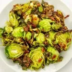 Roasted brussels sprouts with bacon bits and maple glaze