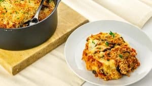 baked eggplant parmesan scooped out into a plate
