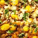 Gnocchi baked with ground meat, tomato sauce, topped with shaved cheese and chopped fresh basil.
